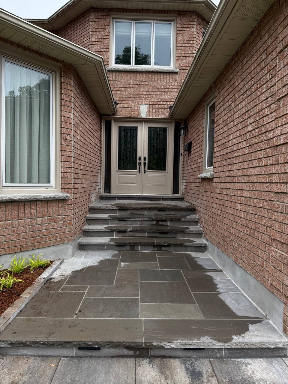 Completed interlocking entrance and stone steps by Vit Bud Landscaping